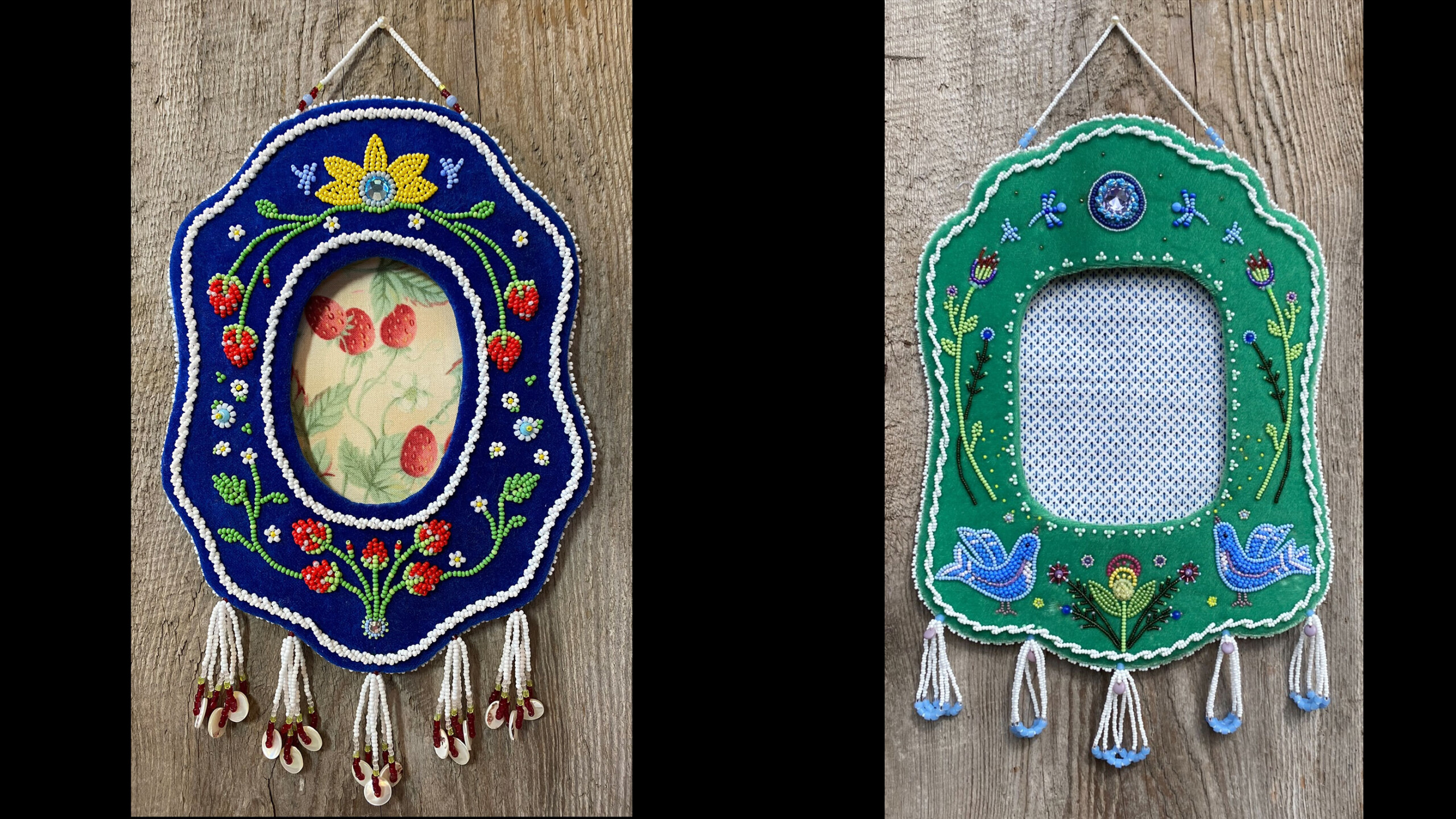 Two ornate, handcrafted frames hang from a wooden surface. The left frame is blue with a decorative floral design featuring red leaves and a yellow flower at the...