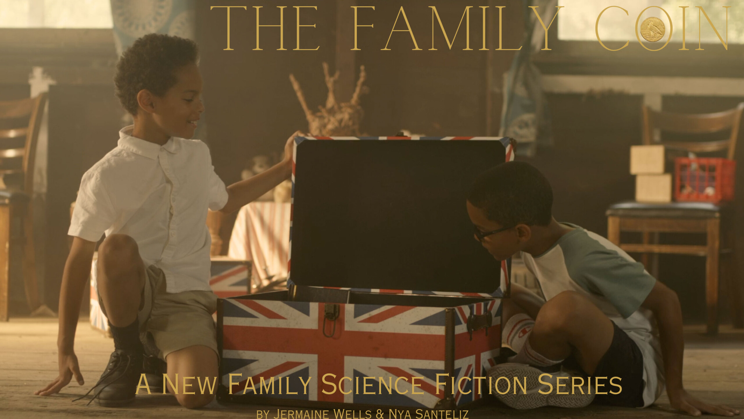 Two boys are focused on a large, open chest decorated with the British flag inside a warmly lit room. They are dressed casually, one wearing a white shirt and the...