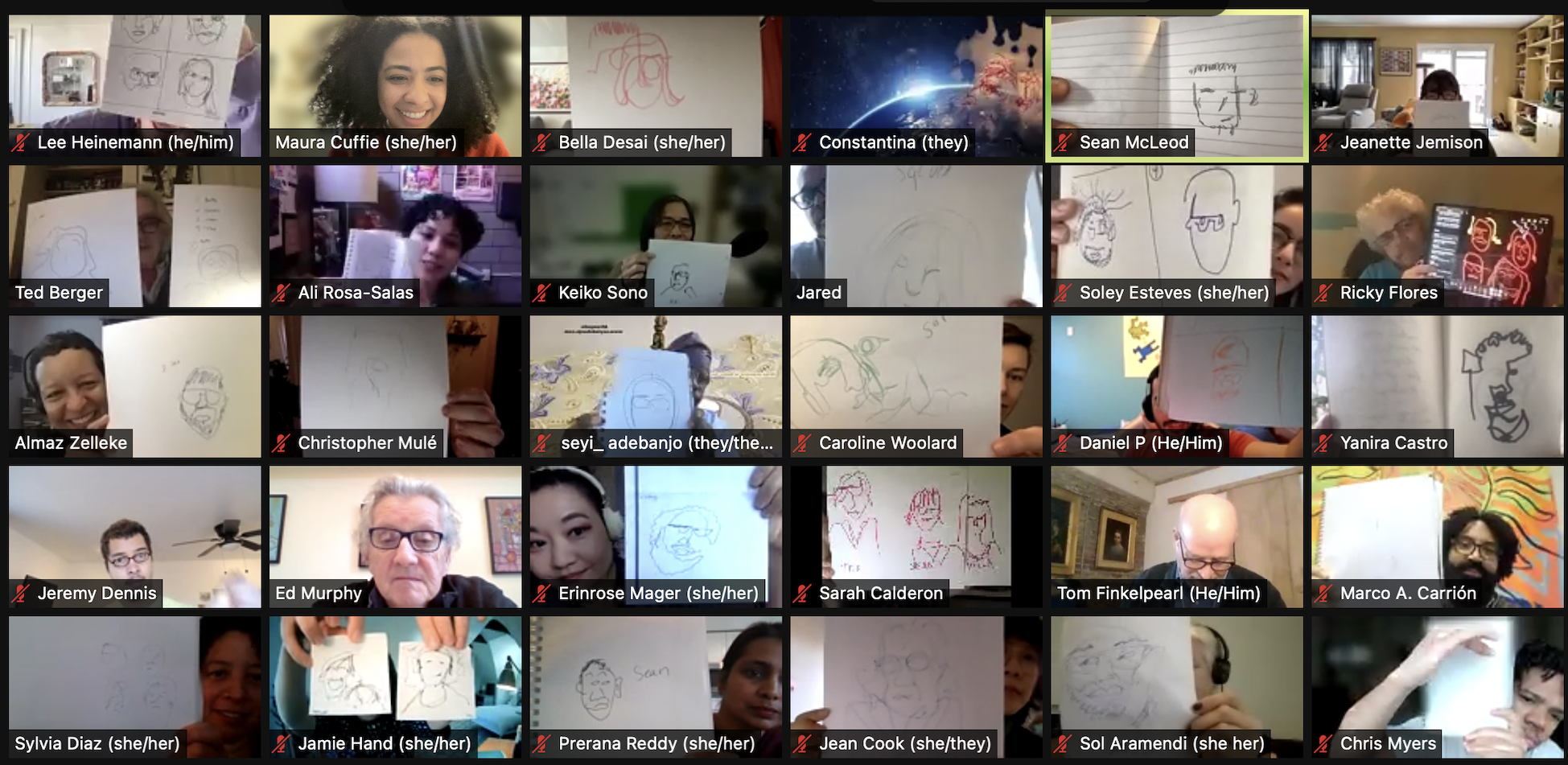 A Zoom video call screenshot showing a grid of participants, each holding up a hand-drawn portrait. The drawings vary in style and detail, and the atmosphere appears...